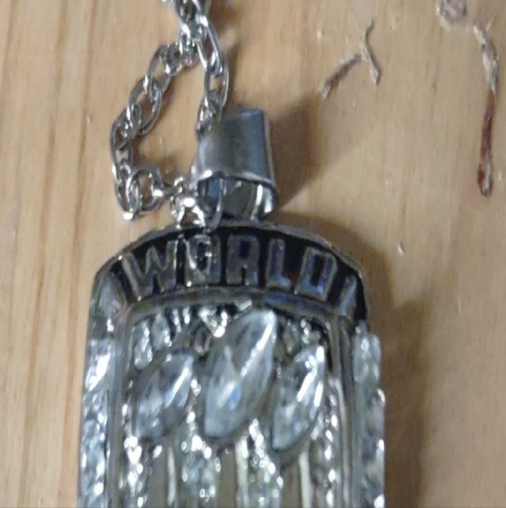 collectible item is a replica necklace of the 2007 New York Giants Super Bowl XL